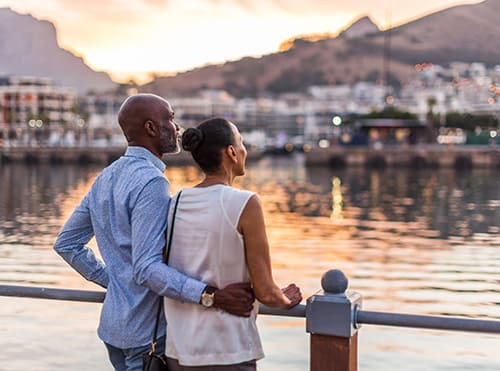 couple overlooking water